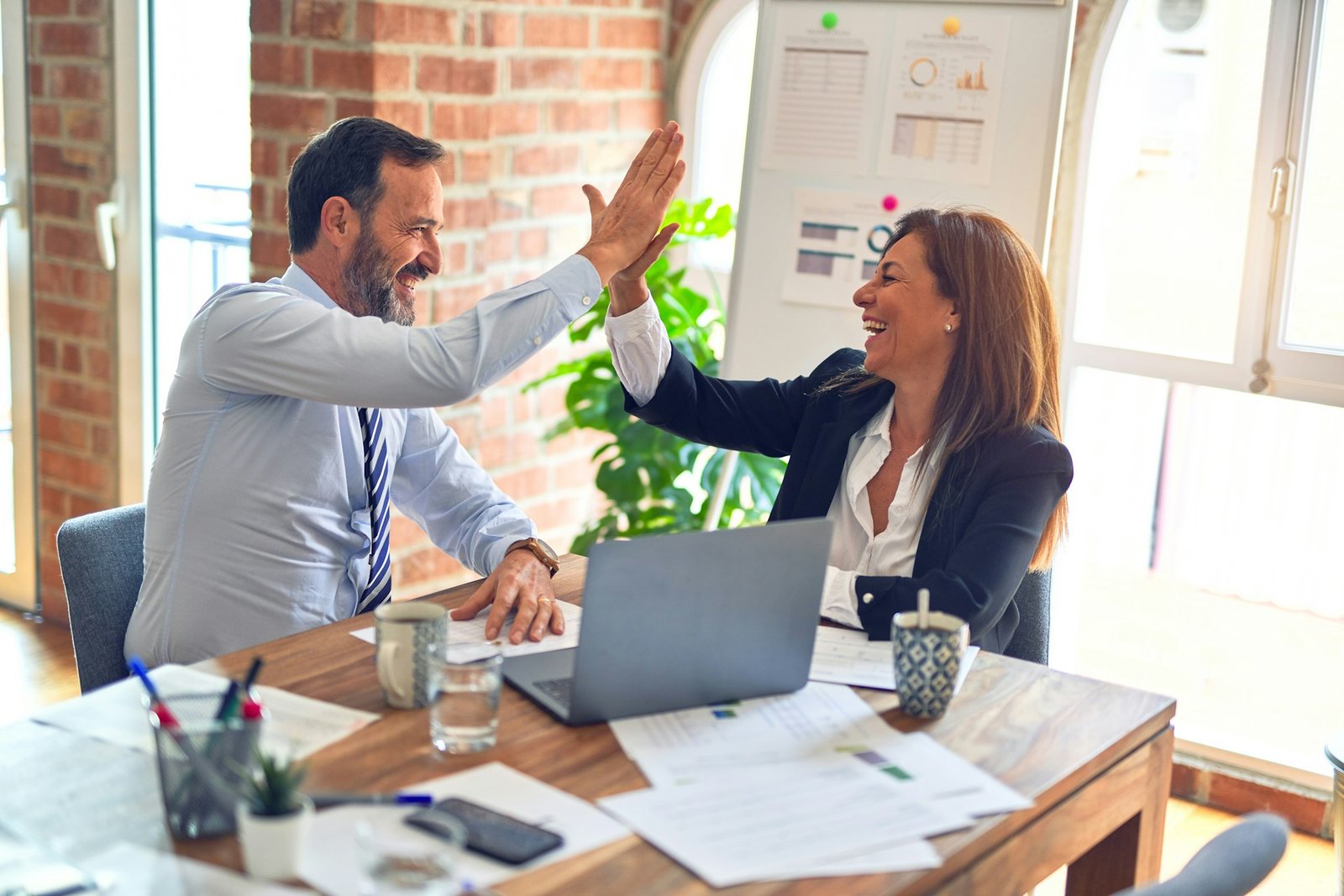 Sesiune de coaching financiar între profesioniști